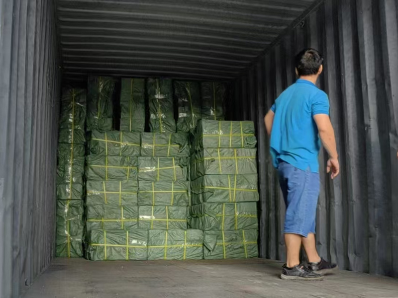 Loading corn cob crushers into 40HQ container for export