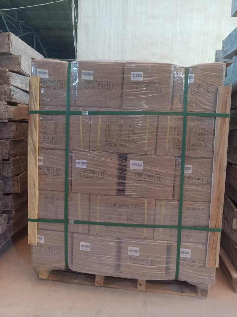 Reinforced packaging for ceramic road studs using high-density bubble wrap to ensure zero breakage during international transit.